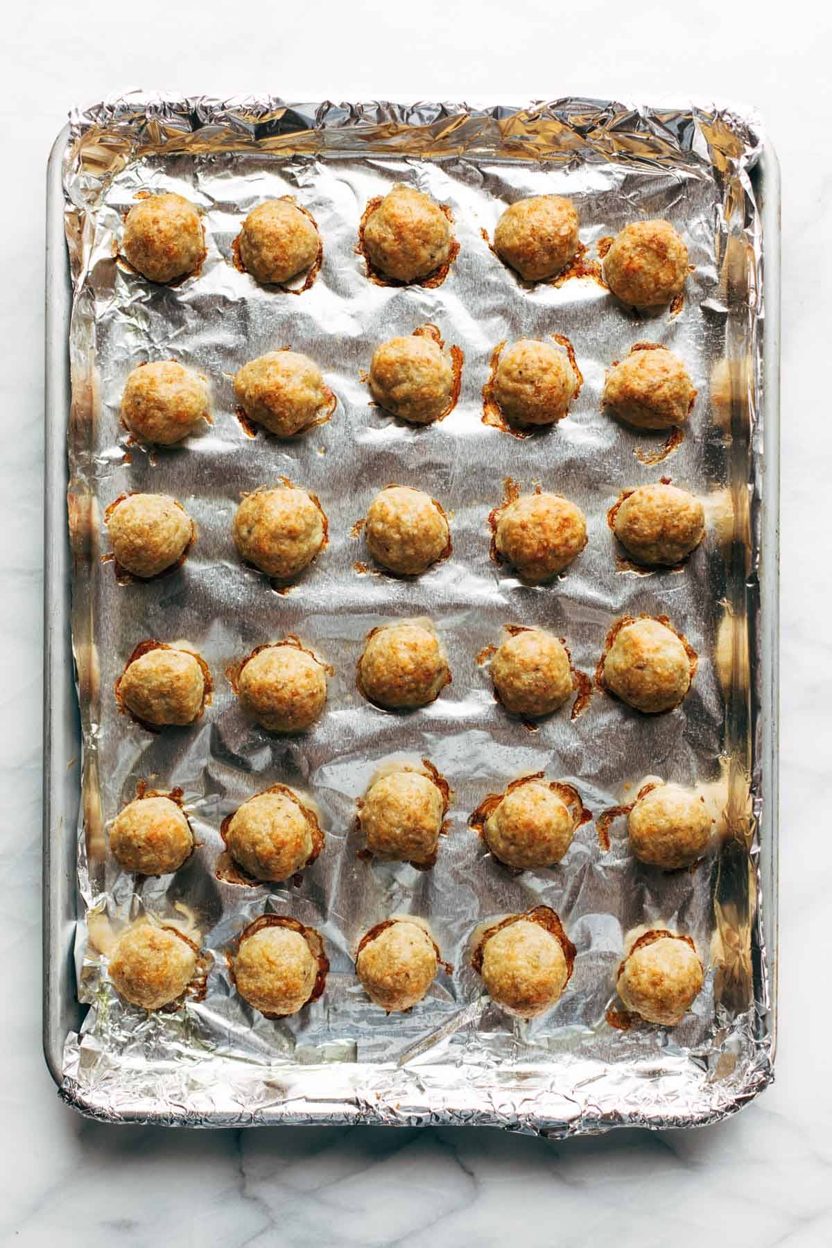 Baked Chicken Meatballs on a sheet pan.