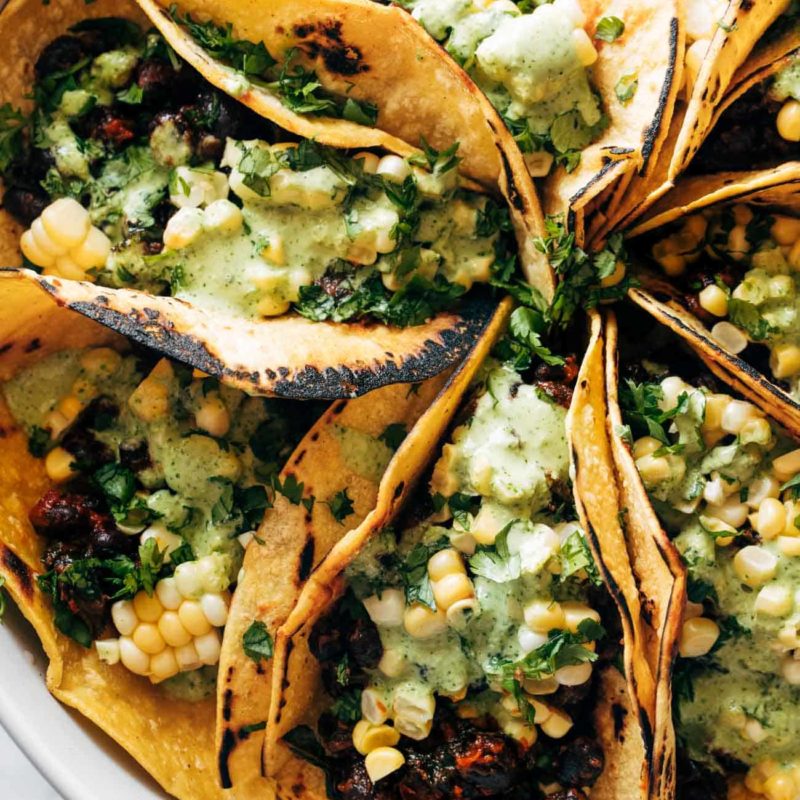 A picture of Smoky Beans & Greens Tacos with Aji Verde