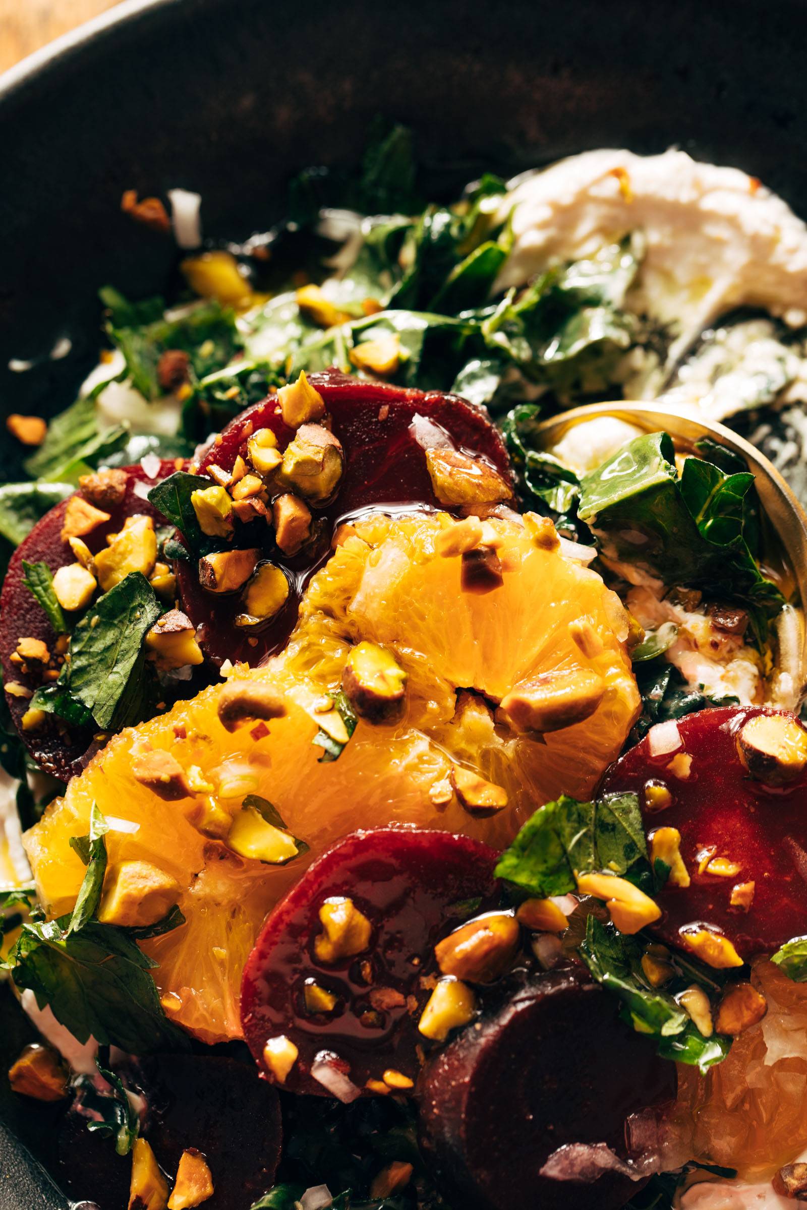 Close-up of beet salad with oranges and truffle ricotta