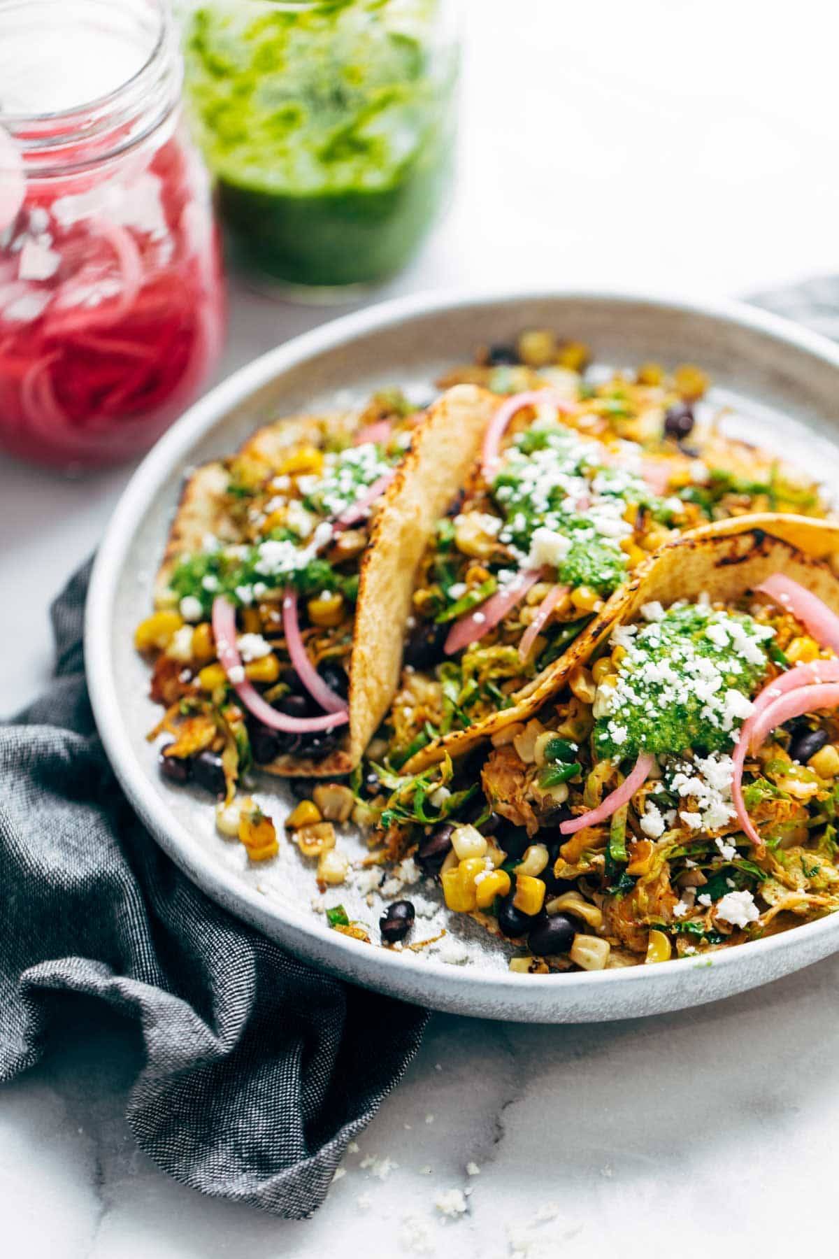 Brussels sprouts tacos on plate.