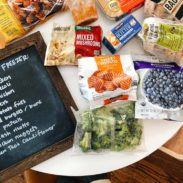 Bags of foods on a white table.