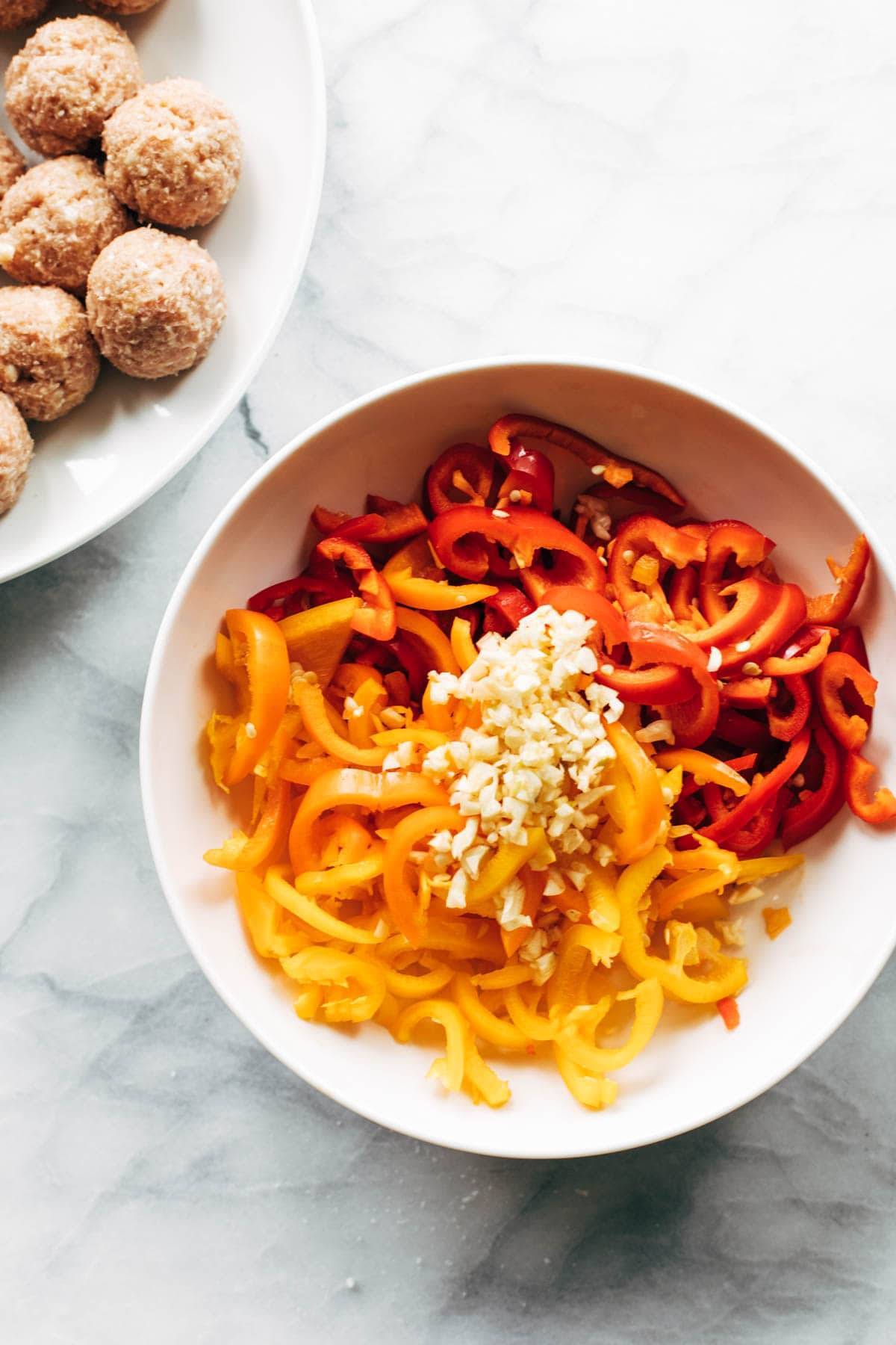 Peppers and garlic in a bowl.