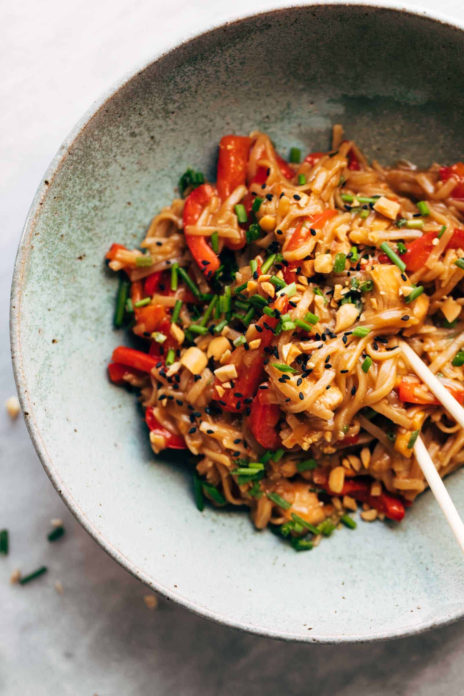 chili garlic instant pot noodles in a bowl with chopsticks