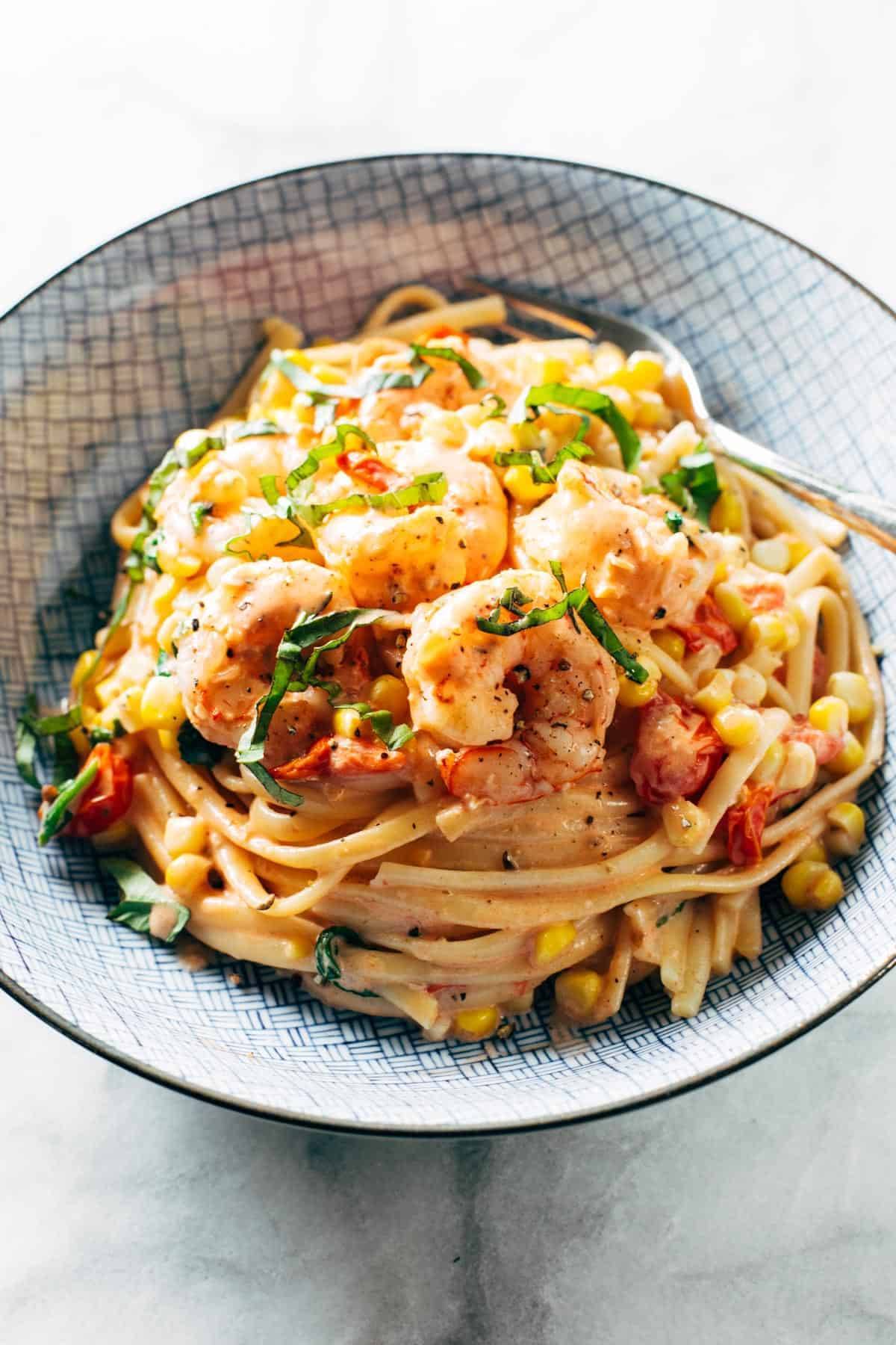 Creamy shrimp pasta in a bowl.