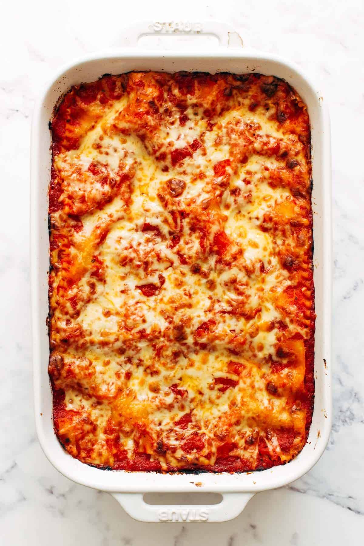 Lasagna florentine in a baking dish after baking.