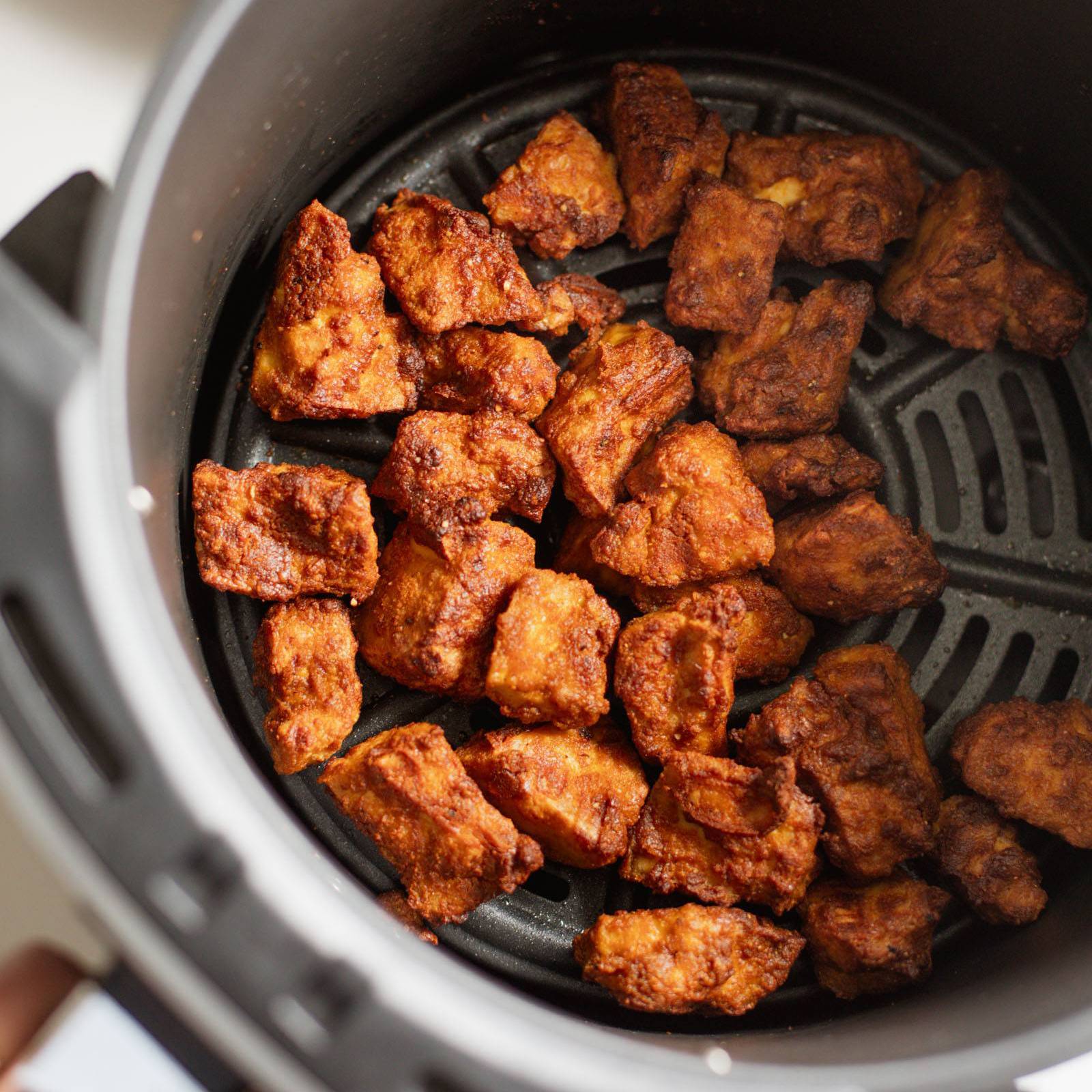 Crispy tofu in an air fryer.