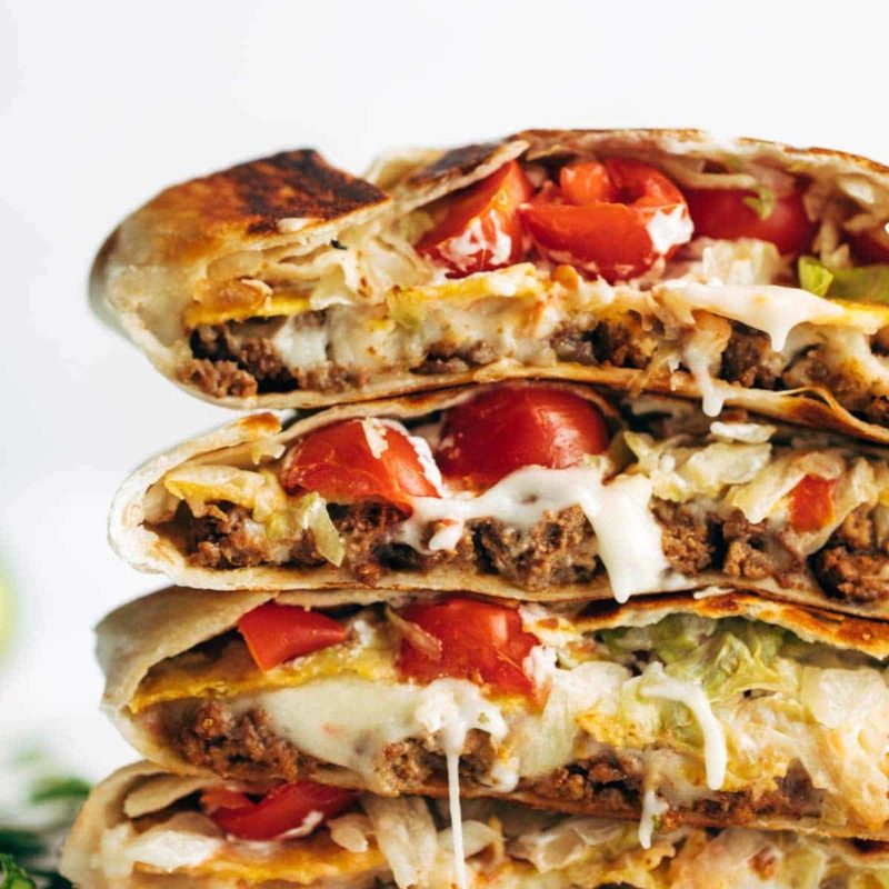 Crunchwrap Supremes in a stack.