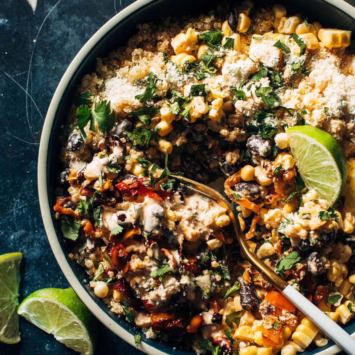 Elote style salad in a bowl with a fork square