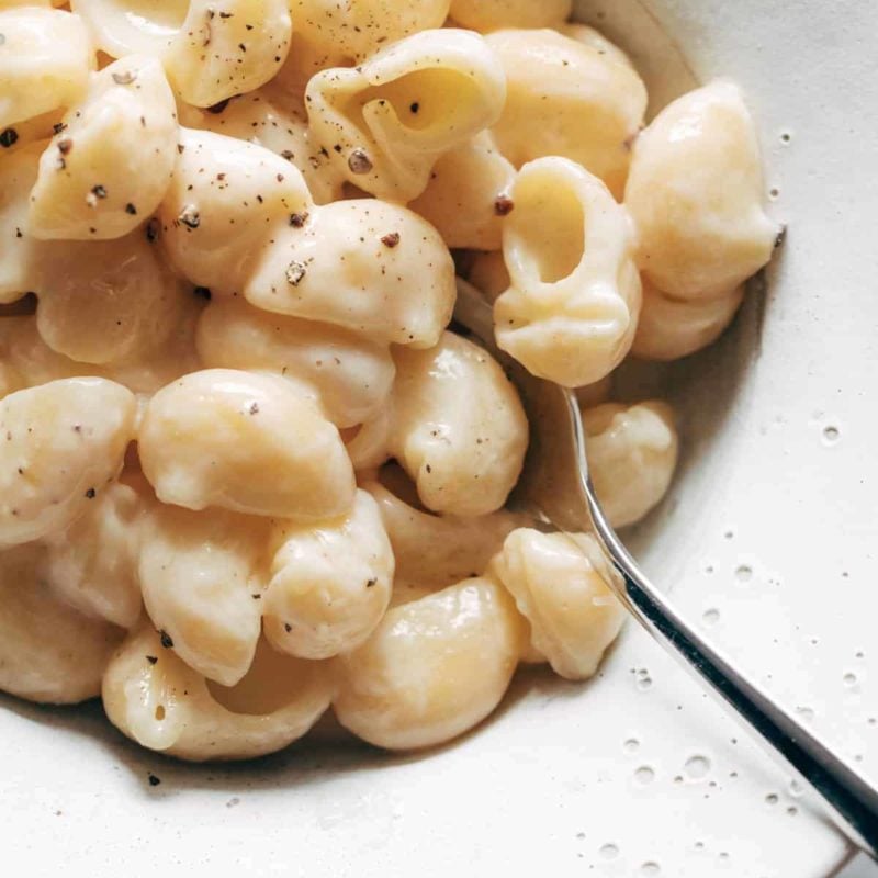 Garlic Parmesan pasta in a bowl with a spoon.