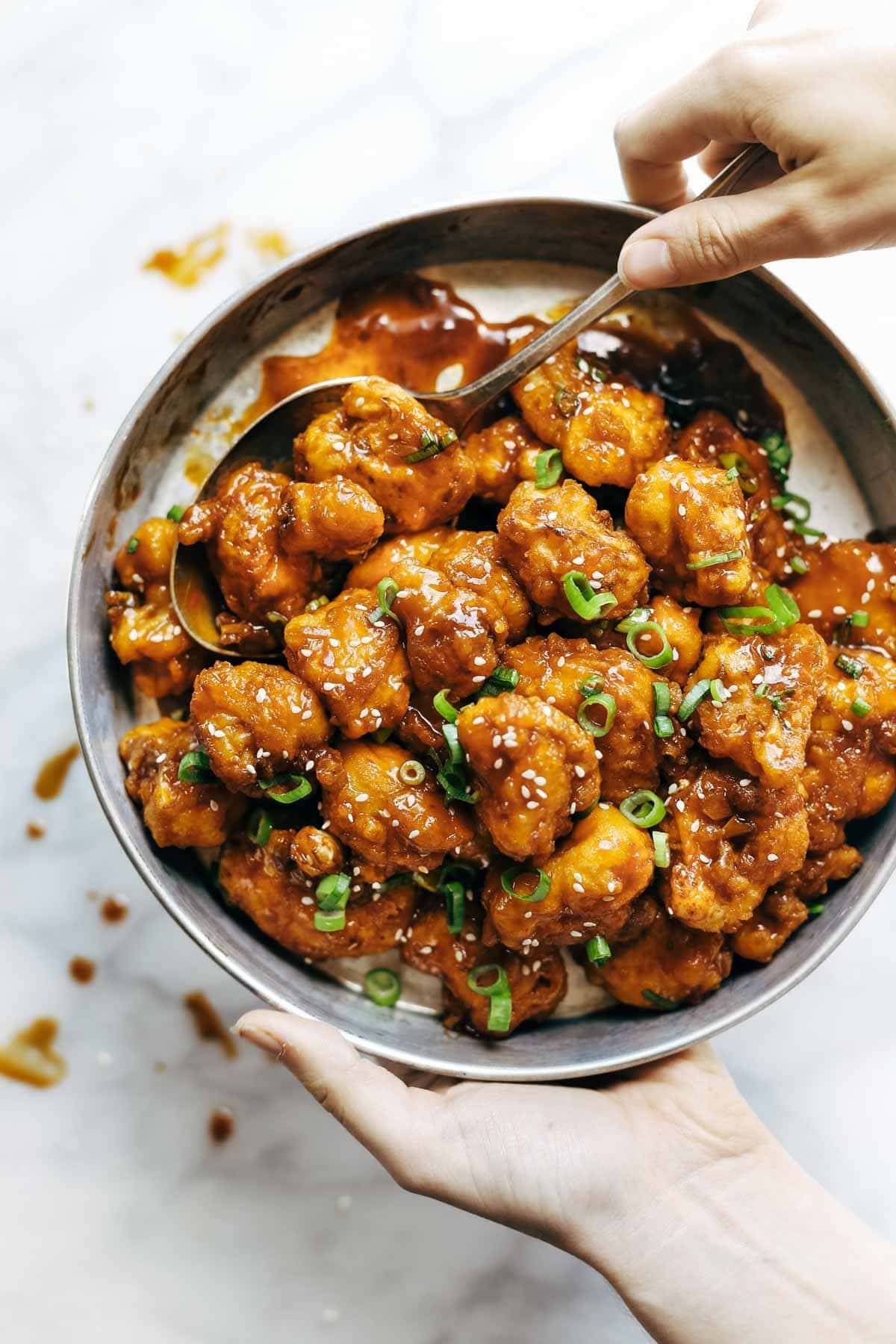 cauliflower in a bowl with a spoon