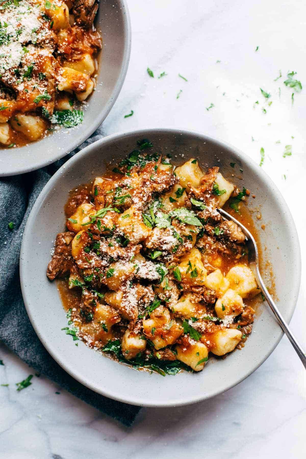 Short Rib Ragu in bowls with gnocchi.