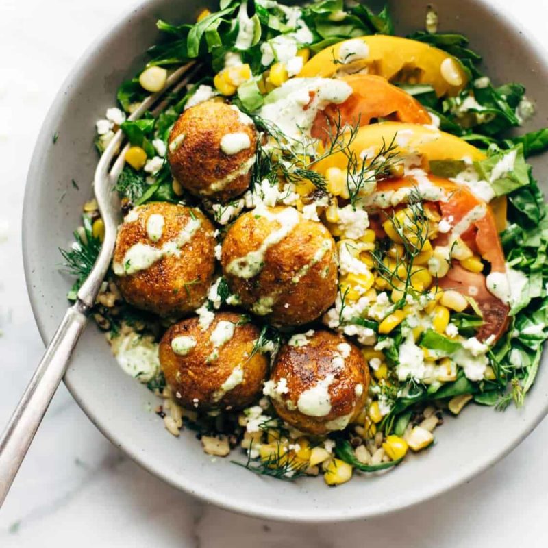 A picture of Summer Bliss Bowls with Sweet Potato Fritters and Jalapeño Ranch