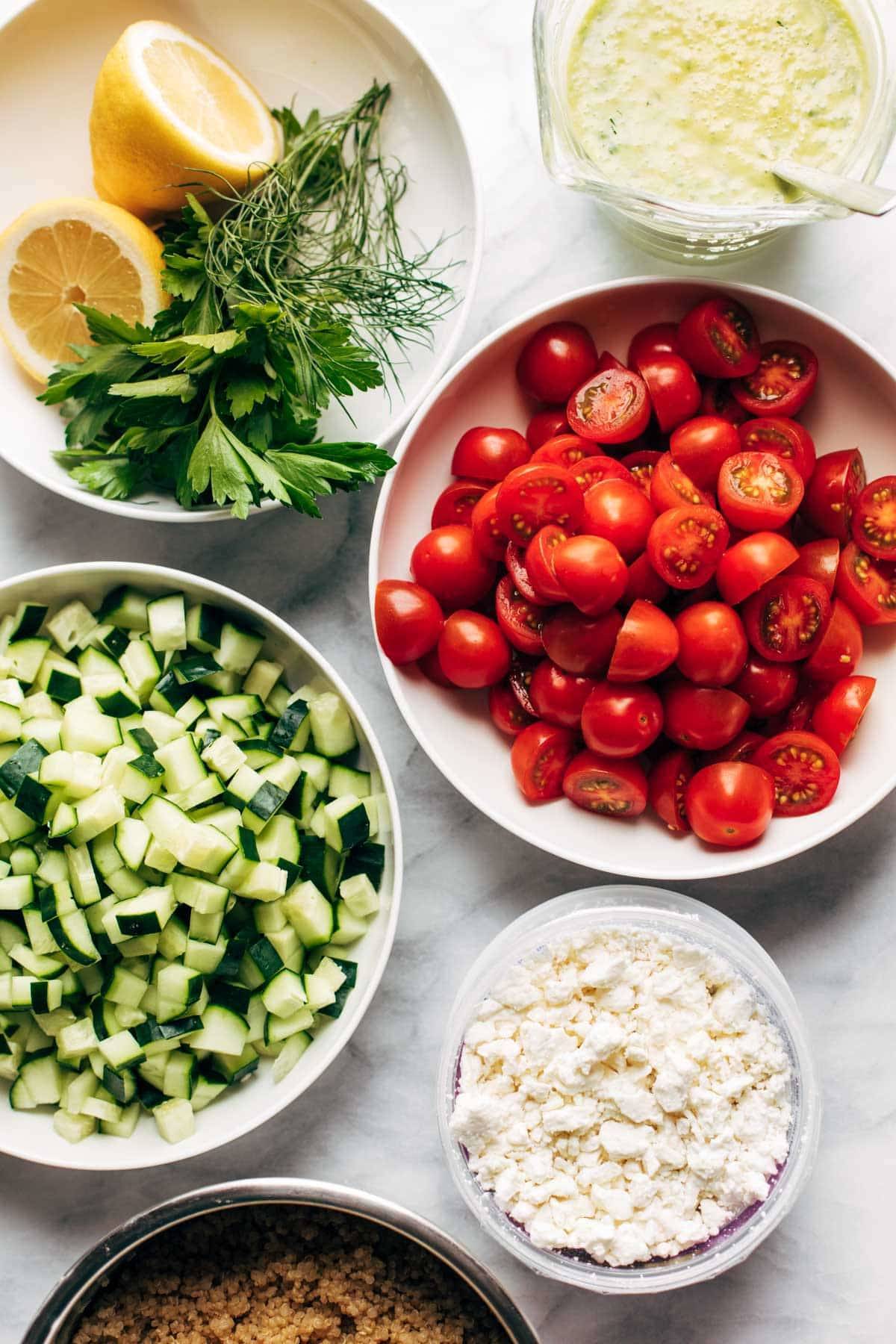 Ingredients in bowls for Summer Quinoa Salad.