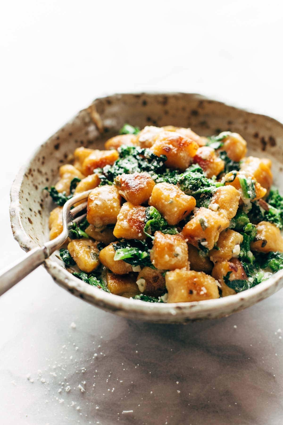 Sweet Potato Gnocchi in a bowl with a fork