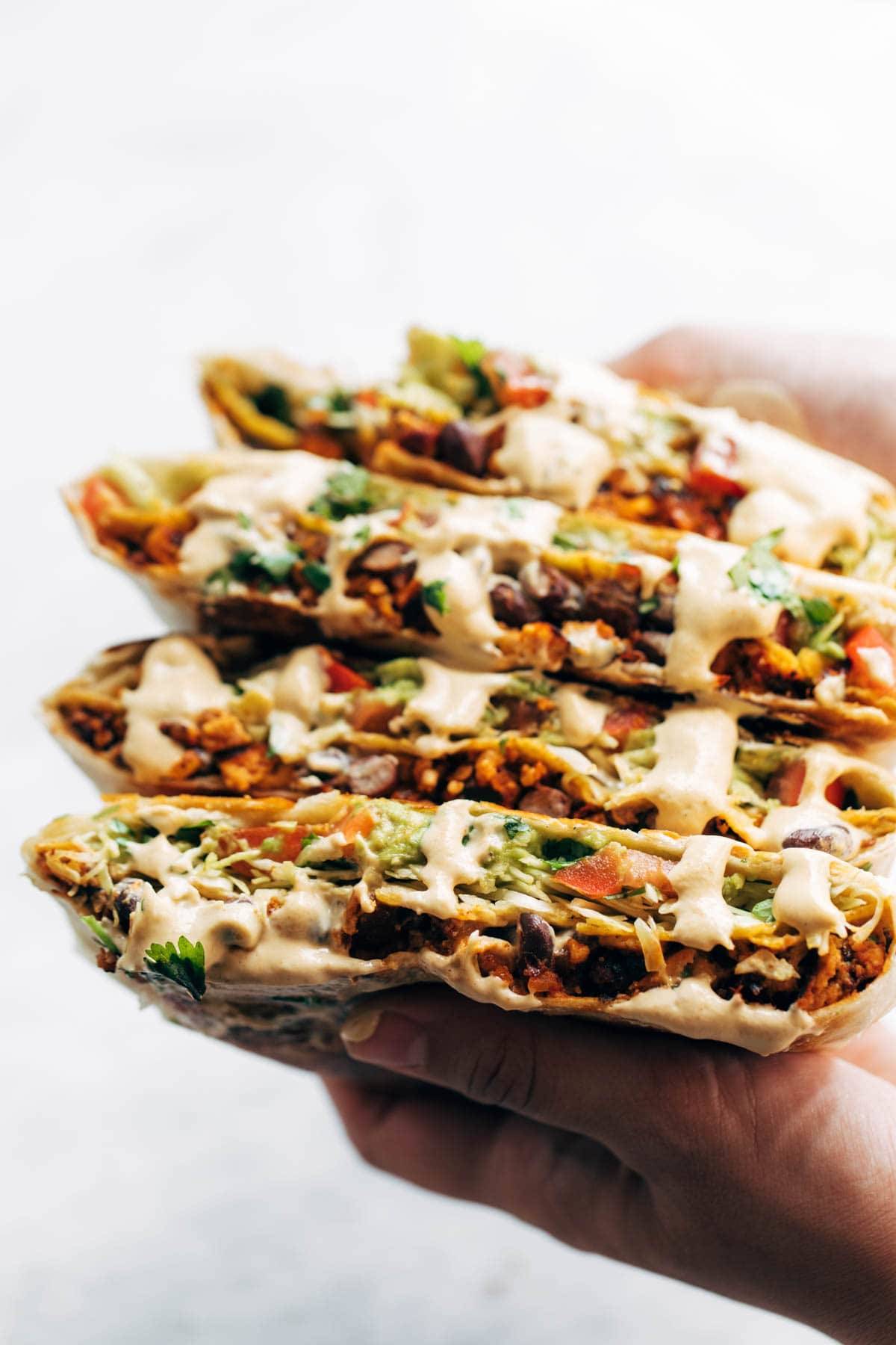 Cashew queso on vegan crunchwrap supreme.