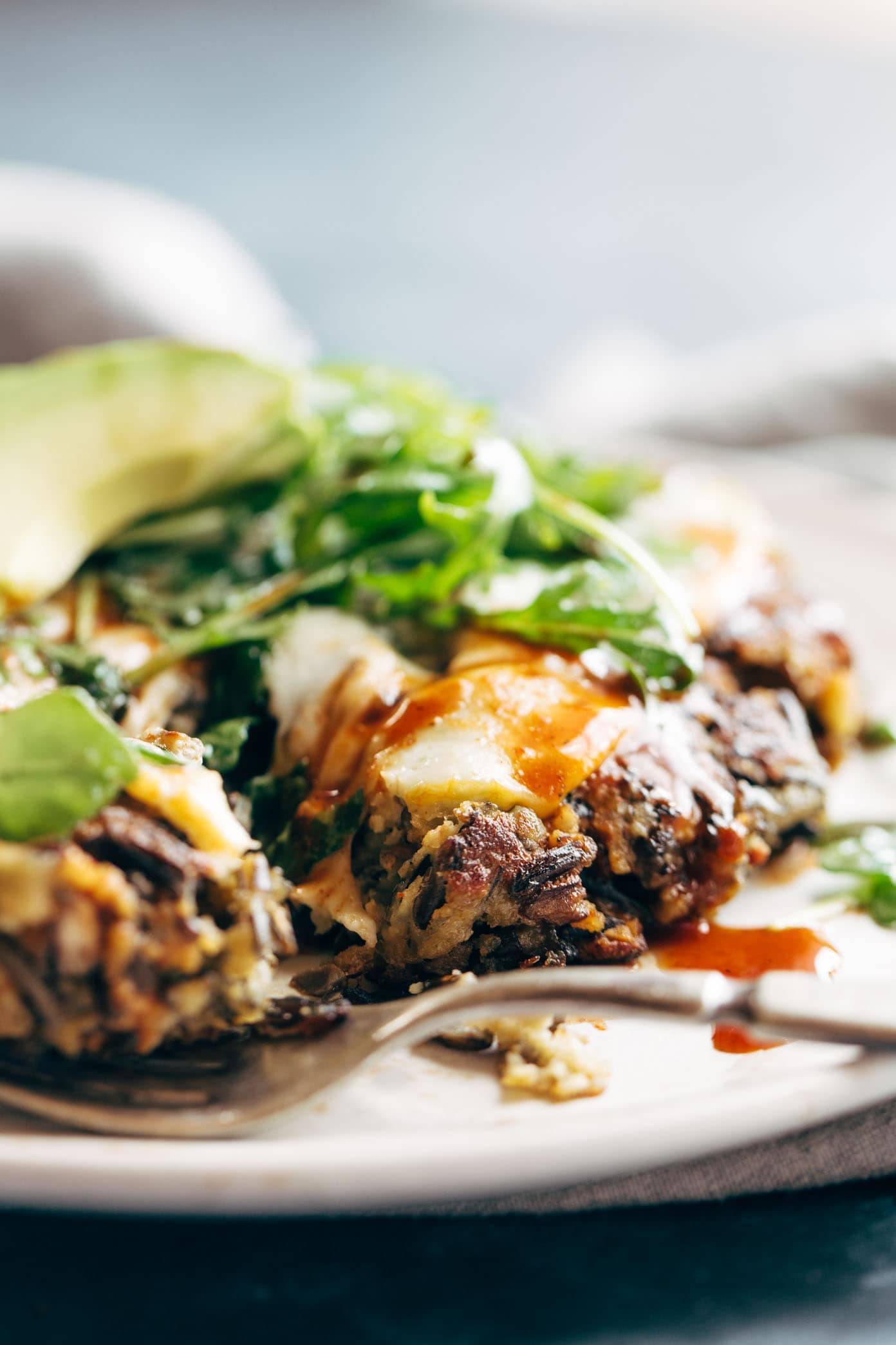 Wild Rice Burger on a plate with a fork.