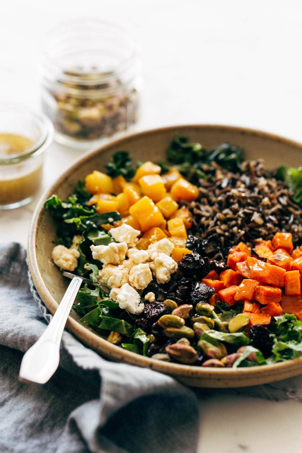 Side view of grain bowl with fork.