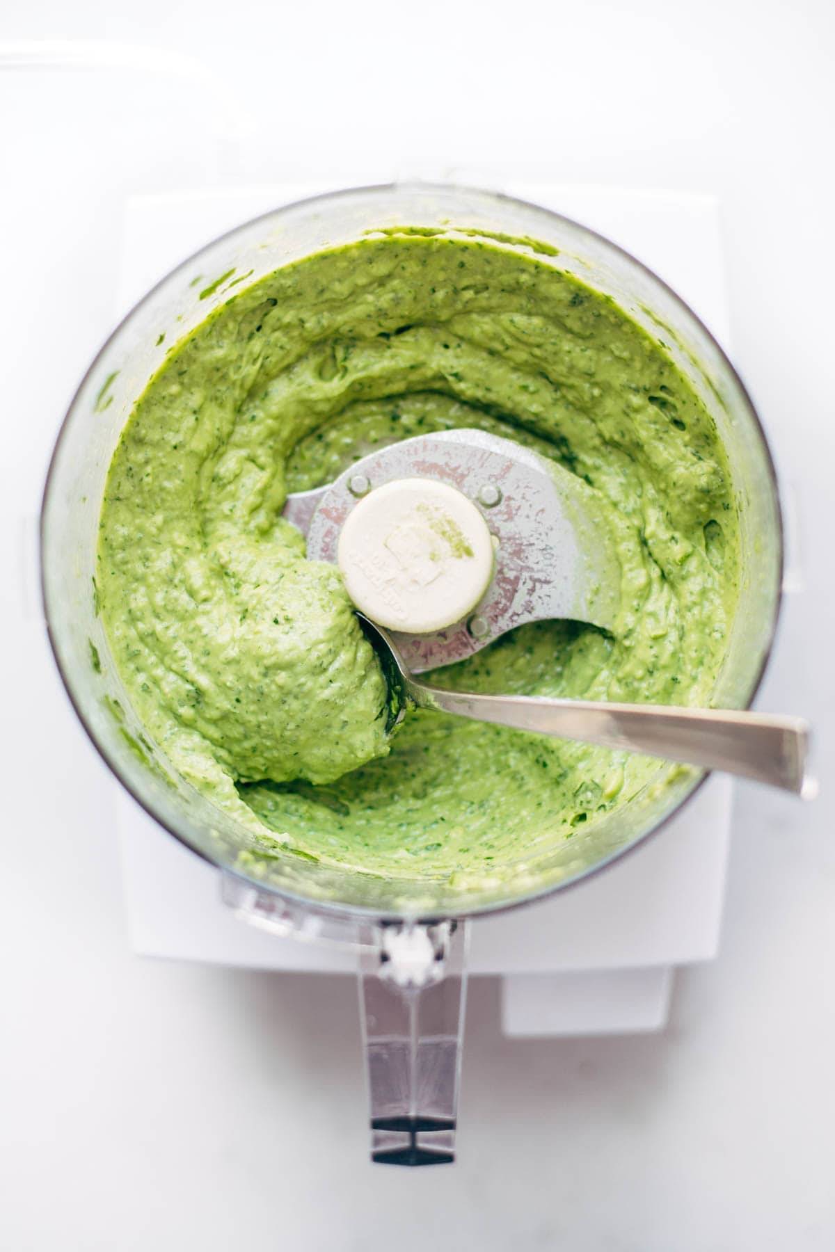 Avocado sauce in a food processor.